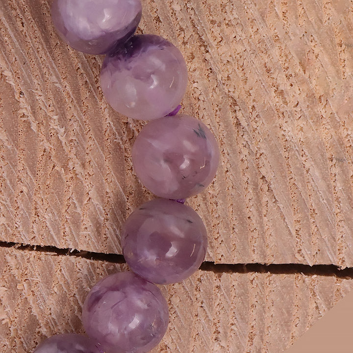 BRACELET CHAROITE SUR QUARTZ A